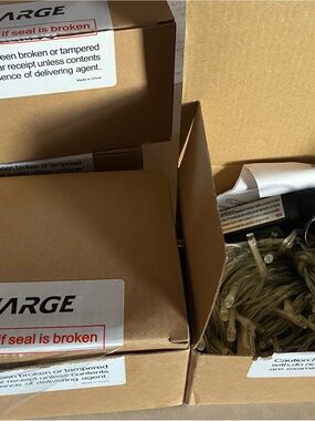 4 boxes of 200 each LED Ucharge Clear String Lights  & 1 box shell string lights